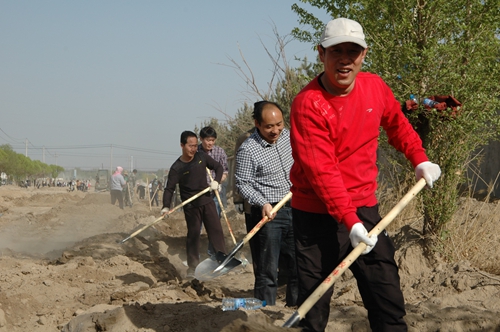 公司組織員工開(kāi)展植樹(shù)活動(dòng)